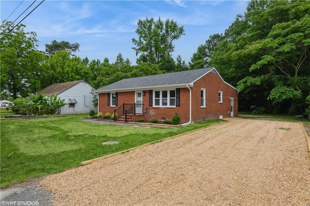 105 Fairfield Ave, Suffolk, VA 23434 - single story home with brick siding, a front lawn, and dirt driveway
