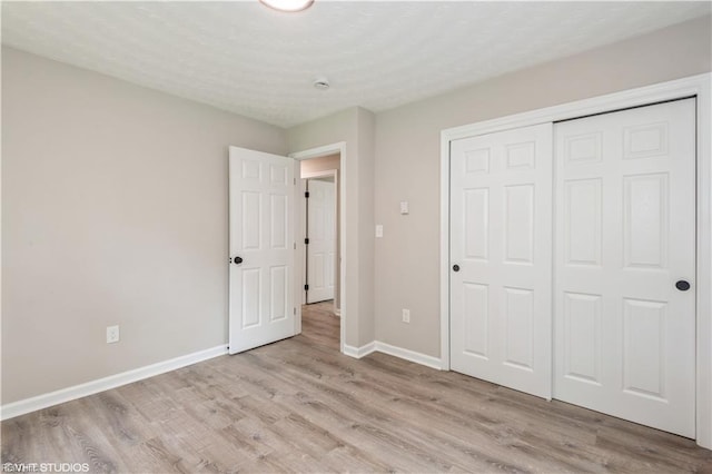 105 Fairfield Ave, Suffolk, VA 23434 - unfurnished bedroom featuring light wood-type flooring and a closet
