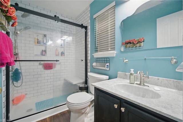 512 S Lake Cir, Chesapeake, VA 23322 - bathroom with vanity, a stall shower, and wood finished floors