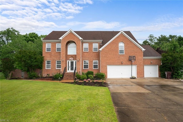 4400 Anchor Bend Ct, Chesapeake, VA 23321 - colonial home featuring concrete driveway, a front yard, brick siding, and an attached garage