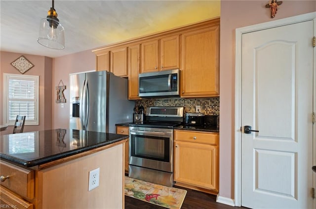 4400 Anchor Bend Ct, Chesapeake, VA 23321 - kitchen with stainless steel appliances, backsplash, a kitchen island, dark stone counters, and dark wood-type flooring