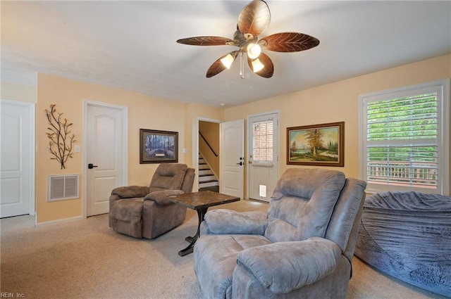 4400 Anchor Bend Ct, Chesapeake, VA 23321 - carpeted living room featuring stairway, healthy amount of natural light, and ceiling fan