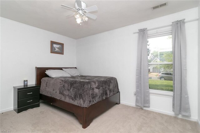 2405 Broadnax Cir, Chesapeake, VA 23323 - bedroom with light colored carpet and a ceiling fan