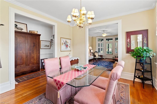812 Stockley Gdns Unit 2, Norfolk, VA 23507 - dining space featuring a chandelier, wood finished floors, crown molding, and a ceiling fan