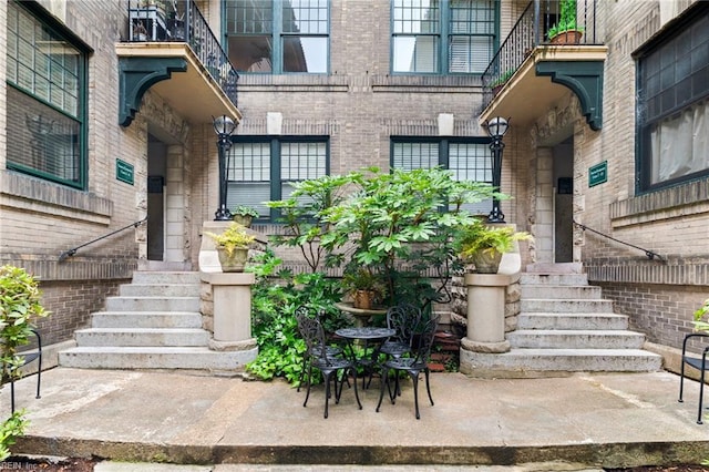 812 Stockley Gdns Unit 2, Norfolk, VA 23507 - doorway to property with brick siding