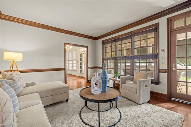 417 Peace Haven Dr, Norfolk, VA 23502 - living room with ornamental molding, wood finished floors, and healthy amount of natural light