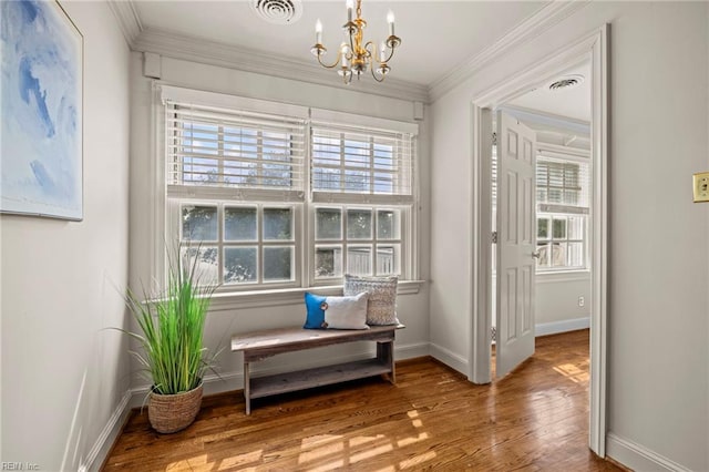417 Peace Haven Dr, Norfolk, VA 23502 - sitting room featuring plenty of natural light, wood finished floors, a chandelier, and ornamental molding