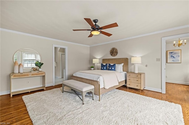 417 Peace Haven Dr, Norfolk, VA 23502 - bedroom with wood finished floors, crown molding, a chandelier, and ceiling fan