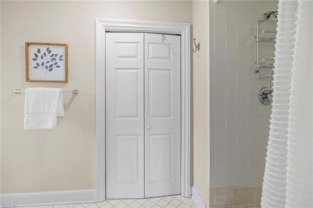 417 Peace Haven Dr, Norfolk, VA 23502 - full bathroom featuring tiled shower, a closet, and tile patterned flooring