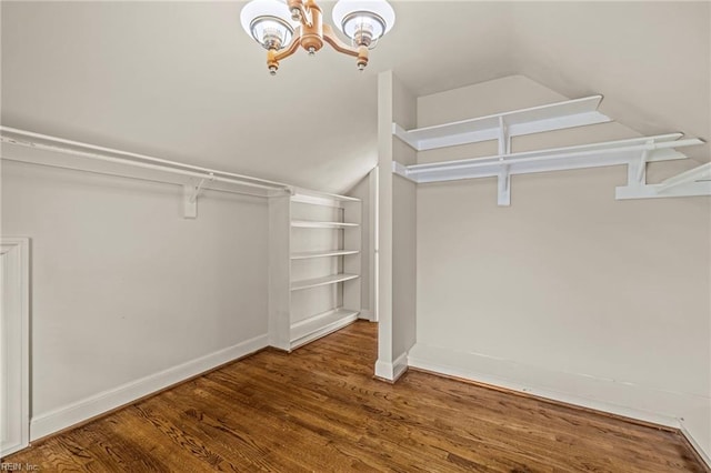 417 Peace Haven Dr, Norfolk, VA 23502 - spacious closet with lofted ceiling, a chandelier, and wood finished floors