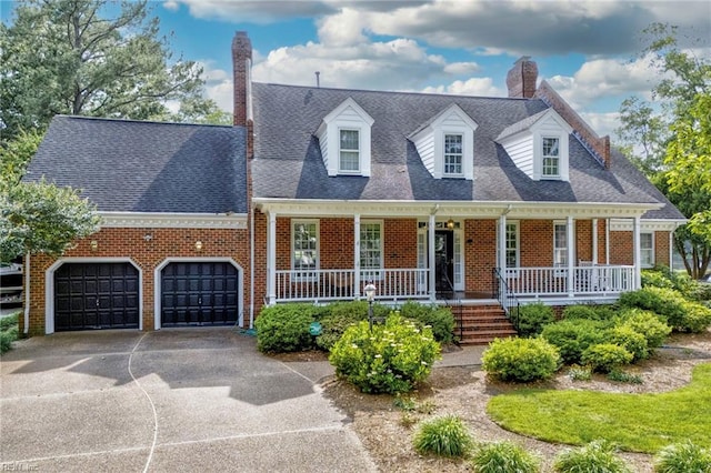 417 Peace Haven Dr, Norfolk, VA 23502 - cape cod home featuring a chimney, a porch, driveway, and brick siding