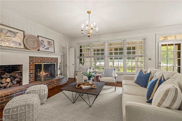 417 Peace Haven Dr, Norfolk, VA 23502 - living room with a chandelier, a fireplace, ornamental molding, and wood finished floors