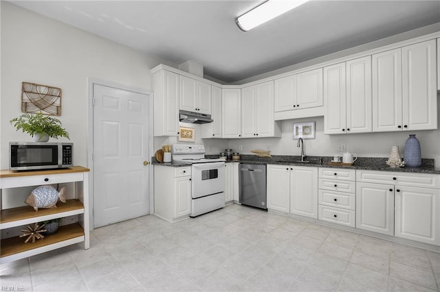 416 27th St, Virginia Beach, VA 23451 - kitchen featuring appliances with stainless steel finishes, under cabinet range hood, dark stone counters, and white cabinetry