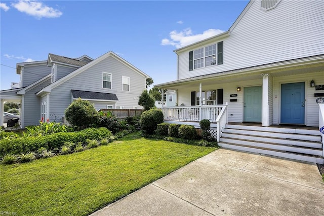 416 27th St, Virginia Beach, VA 23451 - view of front of house featuring covered porch and a front yard