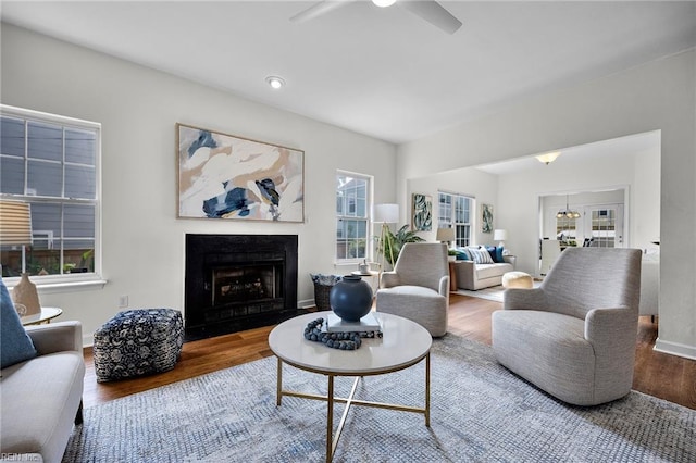 416 27th St, Virginia Beach, VA 23451 - living area with a ceiling fan, wood finished floors, and a fireplace with flush hearth