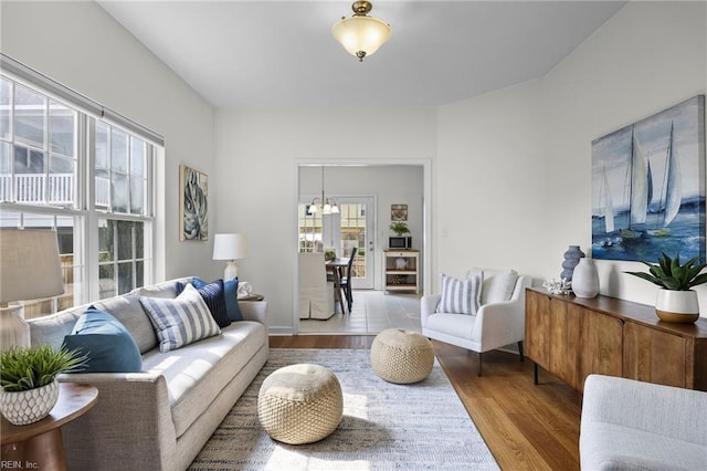 416 27th St, Virginia Beach, VA 23451 - living area with wood finished floors and a chandelier