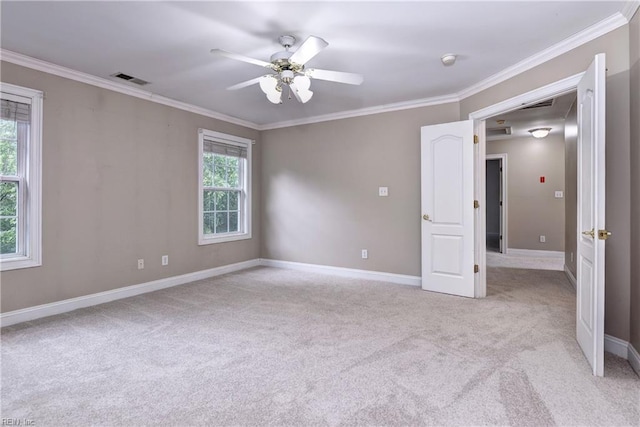 3248 Windsor Rdg, Williamsburg, VA 23188 - spare room featuring light colored carpet, crown molding, a ceiling fan, and a smoke detector
