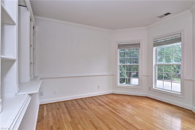 3248 Windsor Rdg, Williamsburg, VA 23188 - spare room with light wood finished floors and crown molding
