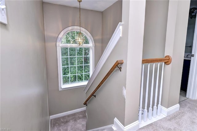 3248 Windsor Rdg, Williamsburg, VA 23188 - staircase featuring carpet floors, a chandelier, and healthy amount of natural light