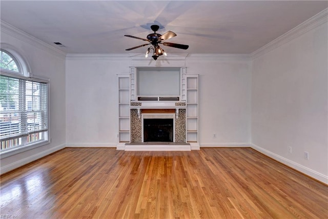3248 Windsor Rdg, Williamsburg, VA 23188 - unfurnished living room featuring light wood finished floors, ceiling fan, crown molding, and a fireplace with raised hearth