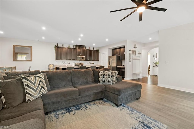 958 Olmstead St, Chesapeake, VA 23323 - living area with arched walkways, a ceiling fan, light wood finished floors, and recessed lighting