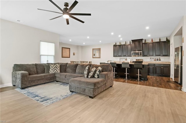 958 Olmstead St, Chesapeake, VA 23323 - living room featuring wood finished floors, ceiling fan, and recessed lighting