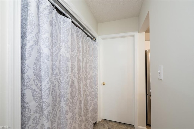 5088 Heathglen Cir, Virginia Beach, VA 23456 - full bathroom featuring a textured ceiling