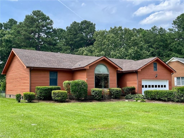 120 Pine St, Camden, NC 27921 - view of front of property featuring roof with shingles, a front lawn, and a garage