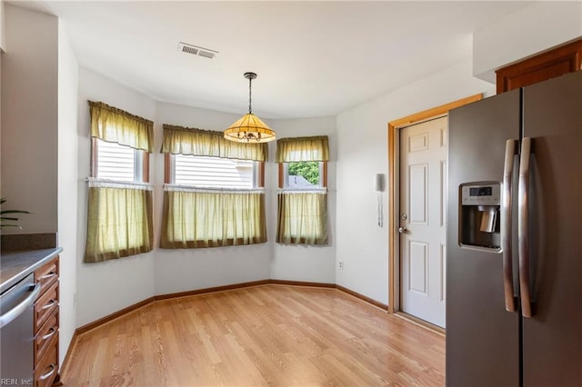 1121 Millay Ct, Virginia Beach, VA 23454 - unfurnished dining area featuring plenty of natural light and light wood-type flooring
