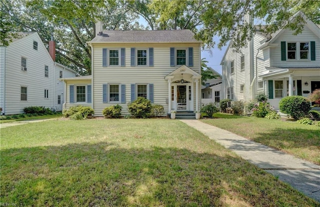1357 Buckingham Ave, Norfolk, VA 23508 - view of front facade with a front lawn and a chimney