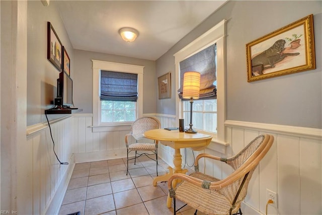 1357 Buckingham Ave, Norfolk, VA 23508 - sitting room featuring a wainscoted wall, light tile patterned flooring, and a decorative wall