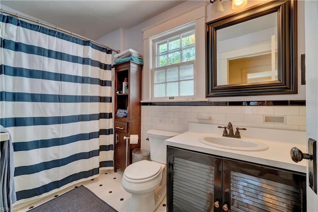 1357 Buckingham Ave, Norfolk, VA 23508 - full bath with vanity, tile walls, tile patterned floors, and a shower with shower curtain