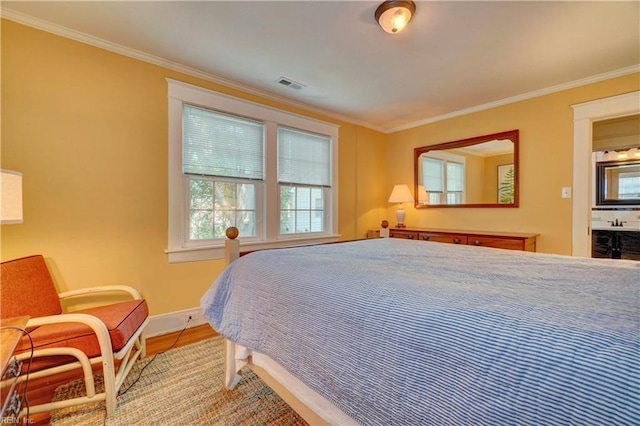 1357 Buckingham Ave, Norfolk, VA 23508 - bedroom with crown molding and wood finished floors