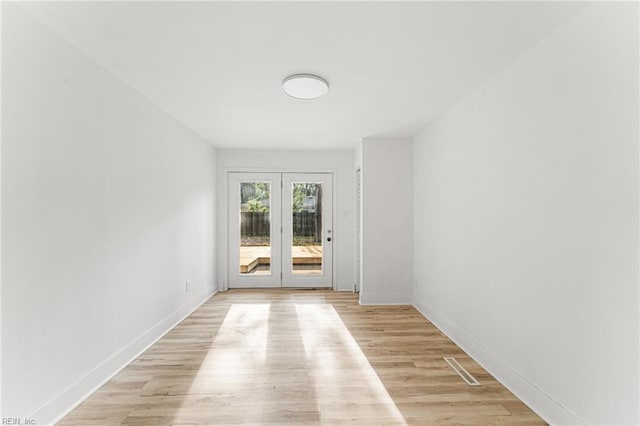 459 Dauphin Ln, Virginia Beach, VA 23452 - spare room featuring french doors and light wood-type flooring