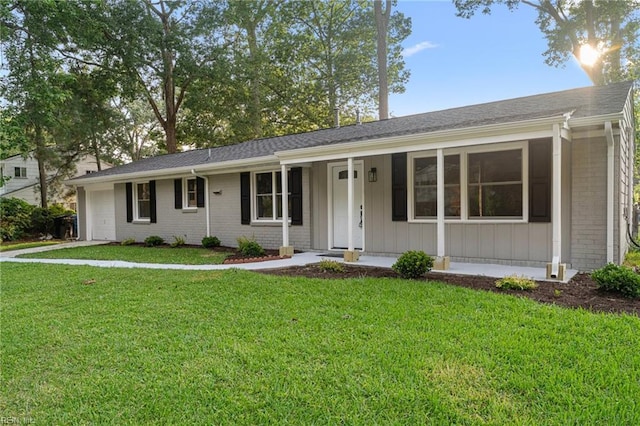 459 Dauphin Ln, Virginia Beach, VA 23452 - ranch-style home featuring brick siding, an attached garage, a front lawn, and a porch