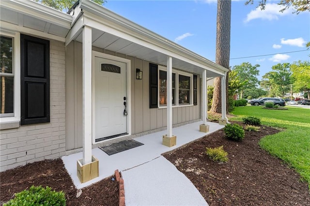 459 Dauphin Ln, Virginia Beach, VA 23452 - entrance to property with covered porch and a yard