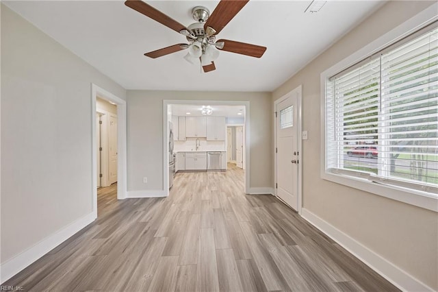 3332 Lusk St, Virginia Beach, VA 23464 - unfurnished living room featuring a ceiling fan, plenty of natural light, and light wood-type flooring