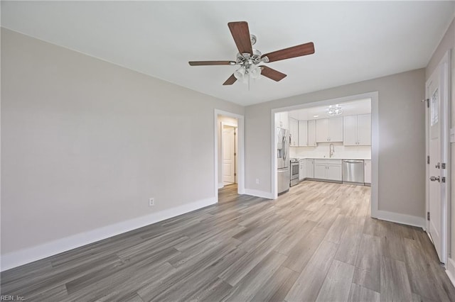 3332 Lusk St, Virginia Beach, VA 23464 - unfurnished living room featuring ceiling fan and light wood-style flooring