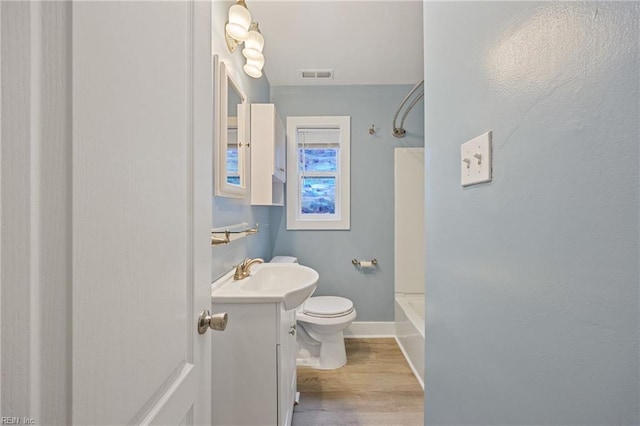 3332 Lusk St, Virginia Beach, VA 23464 - full bathroom with vanity, wood finished floors, and shower / bathtub combination