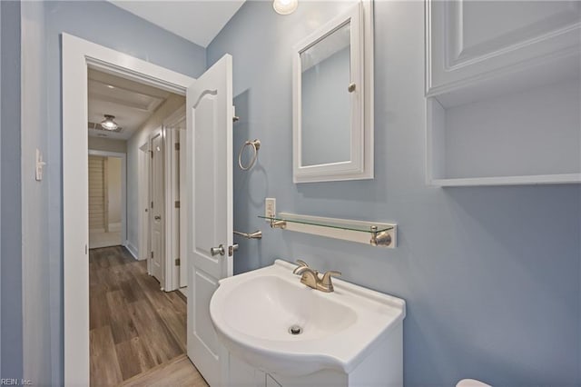 3332 Lusk St, Virginia Beach, VA 23464 - half bathroom with vanity and wood finished floors