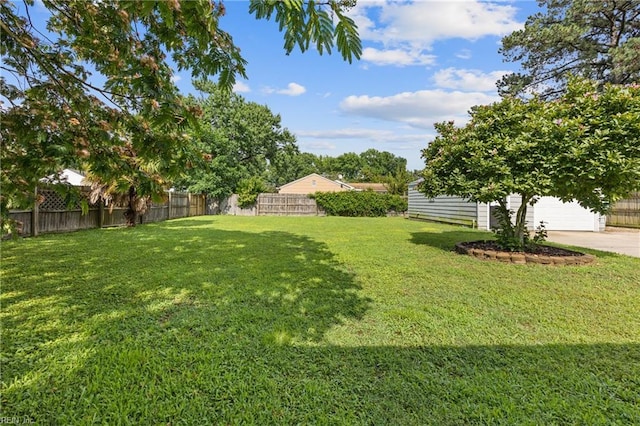 3332 Lusk St, Virginia Beach, VA 23464 - view of yard featuring a garage and driveway