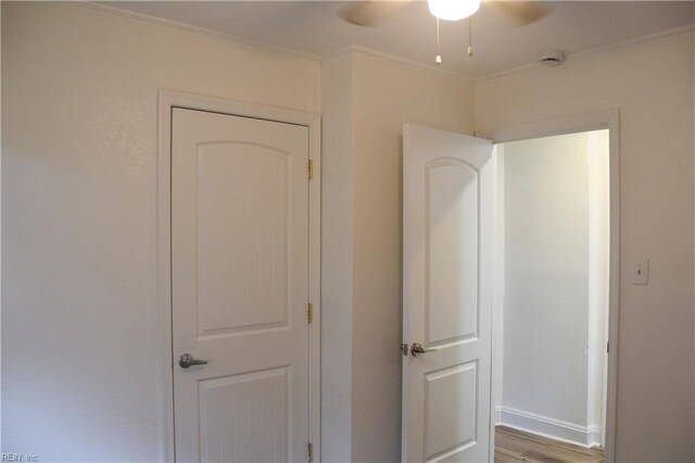 1910 N Lakeland Dr, Norfolk, VA 23518 - unfurnished bedroom with crown molding, wood finished floors, and ceiling fan