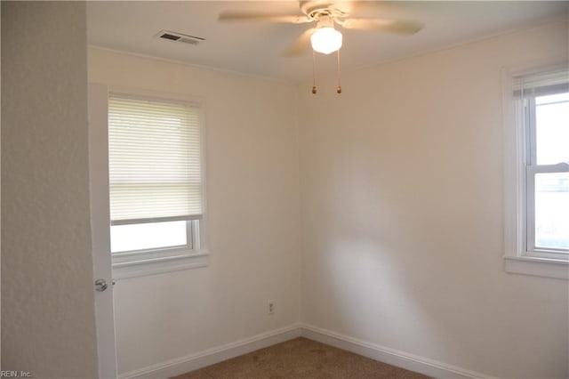 1910 N Lakeland Dr, Norfolk, VA 23518 - unfurnished room featuring a ceiling fan, carpet, and crown molding