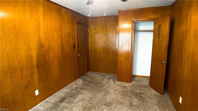 1220 E Balview Ave, Norfolk, VA 23503 - carpeted empty room with a ceiling fan and wooden walls