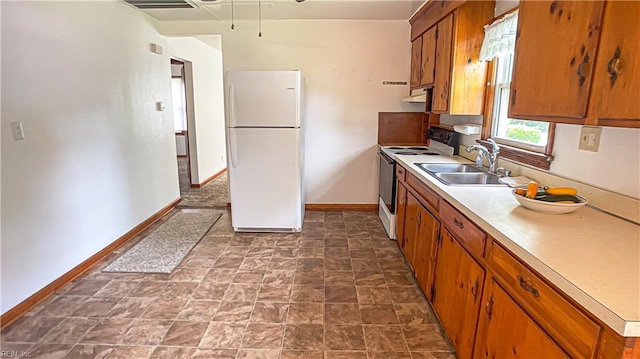 1220 E Balview Ave, Norfolk, VA 23503 - kitchen featuring white appliances, brown cabinets, light countertops, and under cabinet range hood