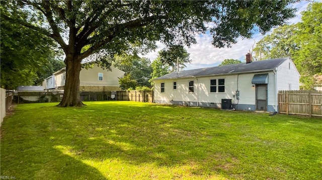 1220 E Balview Ave, Norfolk, VA 23503 - rear view of property featuring a chimney and a fenced backyard