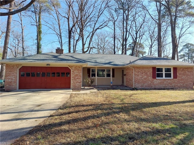 204 Devils Den Rd, Hampton, VA 23669 - single story home with an attached garage, driveway, brick siding, and a chimney