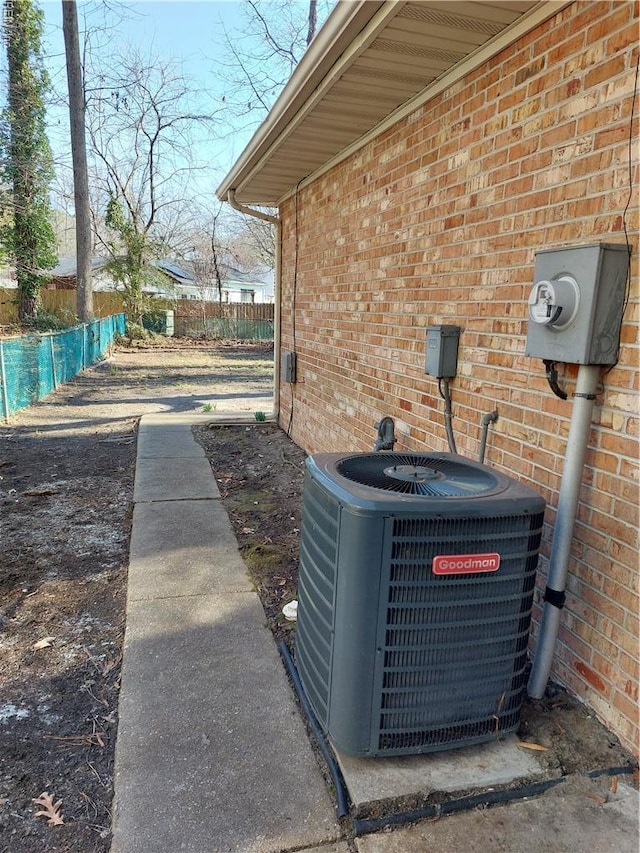 204 Devils Den Rd, Hampton, VA 23669 - exterior view of a central air condition unit and brick siding