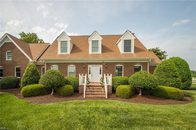 1040 Sanderson Rd, Chesapeake, VA 23322 - view of front of property featuring a front lawn, brick siding, and a shingled roof