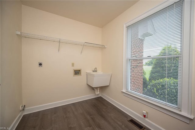 1040 Sanderson Rd, Chesapeake, VA 23322 - washroom with washer hookup, hookup for an electric dryer, dark wood finished floors, and plenty of natural light